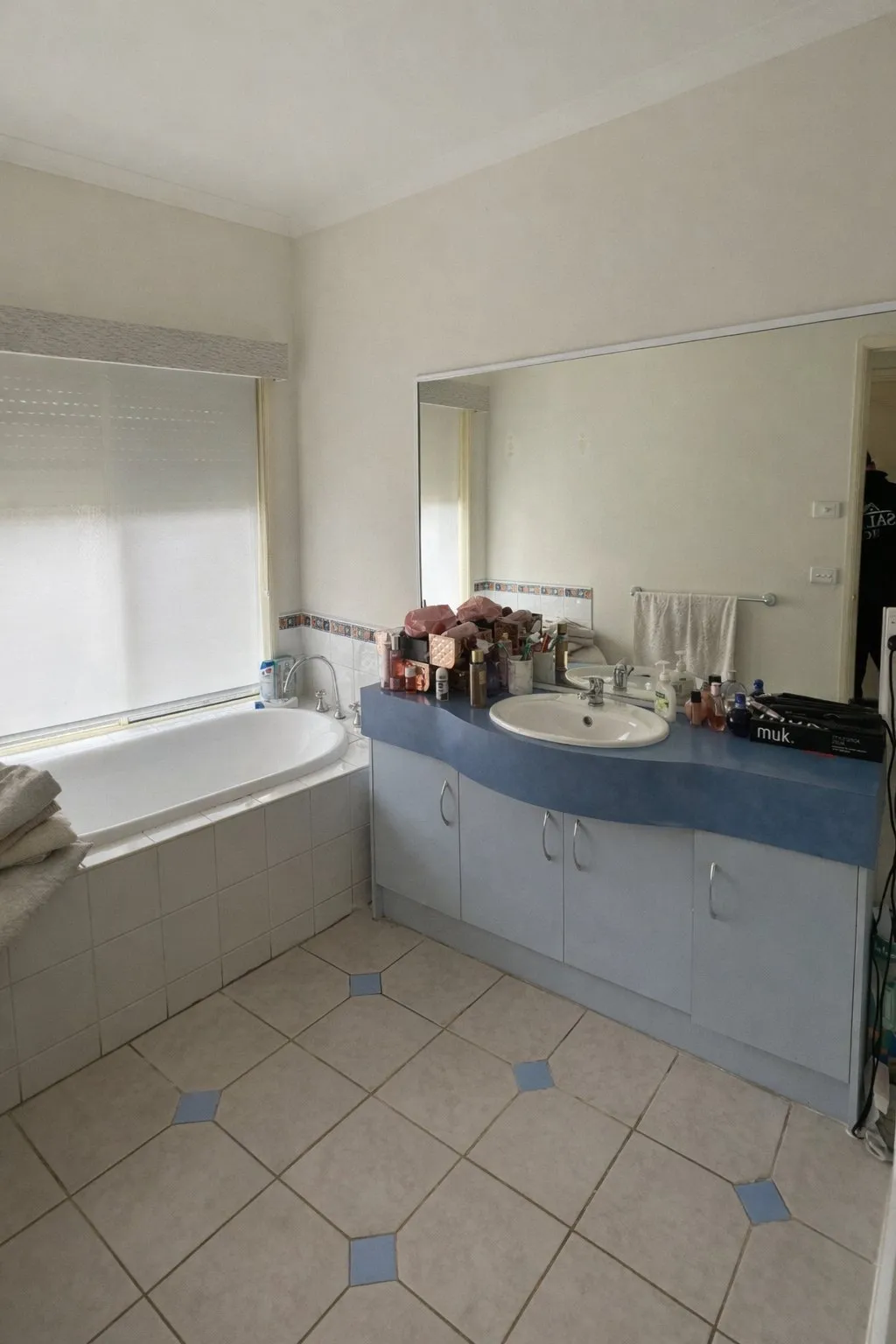Dated bathroom before renovation