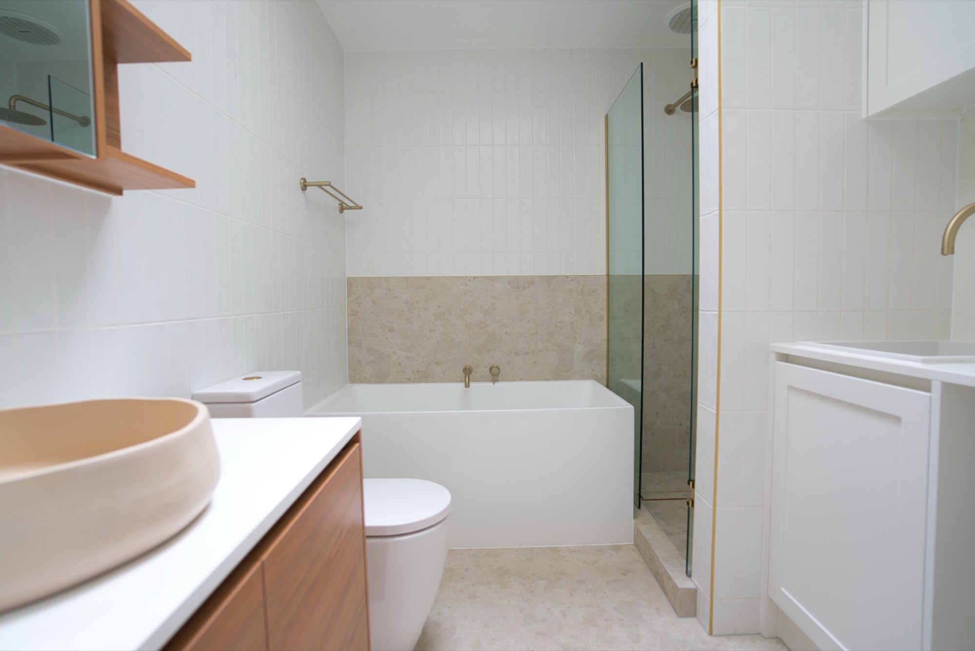 Full bathroom renovation with bath, walk-in shower and timber vanity